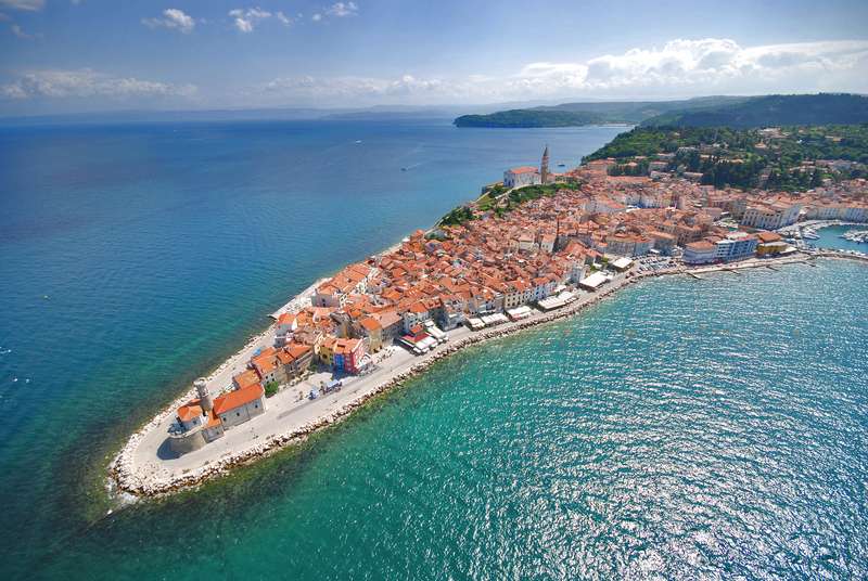 Beach Piran, Slovenia, is a quiet beach community in the Adriatic Sea.